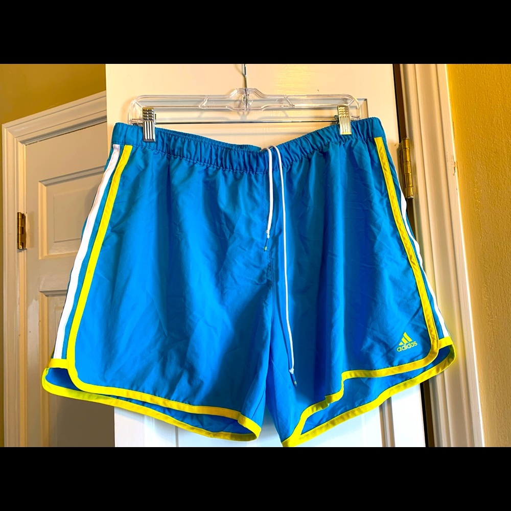 Blue adidas running shorts